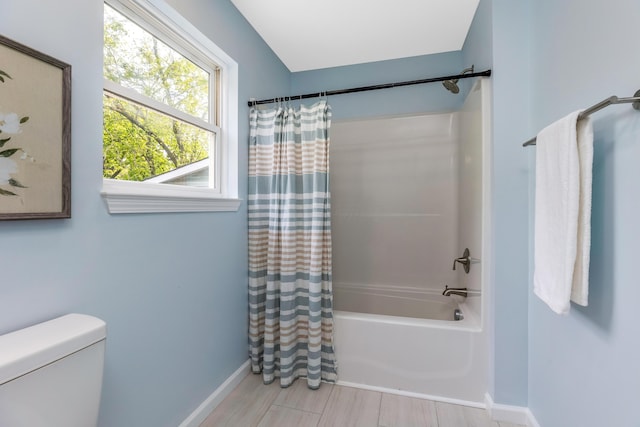 225 Reeb Ave, Columbus, OH 43207 - full bath with shower / tub combo with curtain and baseboards