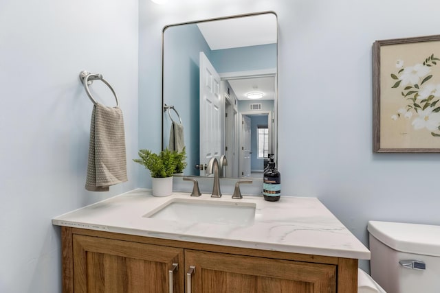 225 Reeb Ave, Columbus, OH 43207 - bathroom featuring vanity and toilet