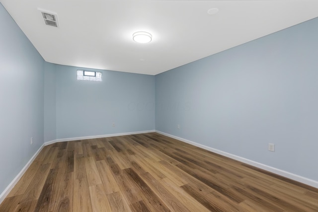 225 Reeb Ave, Columbus, OH 43207 - spare room with wood finished floors and baseboards