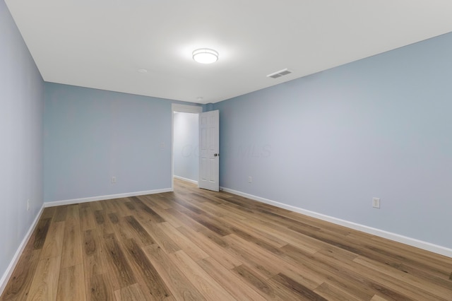 225 Reeb Ave, Columbus, OH 43207 - empty room featuring wood finished floors and baseboards