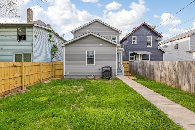 225 Reeb Ave, Columbus, OH 43207 - rear view of house featuring a fenced backyard