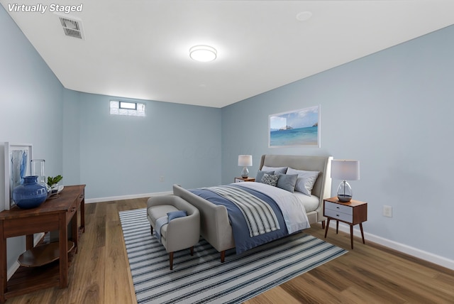 225 Reeb Ave, Columbus, OH 43207 - bedroom featuring wood finished floors and baseboards
