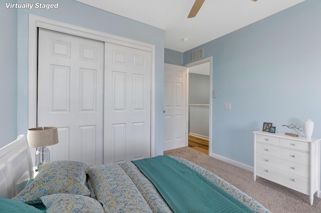 225 Reeb Ave, Columbus, OH 43207 - bedroom featuring carpet, a closet, and ceiling fan