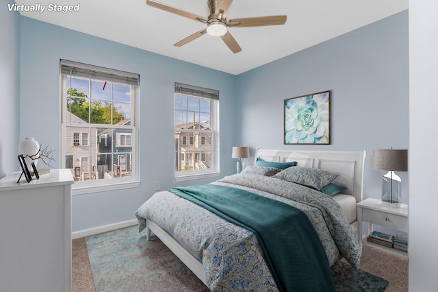 225 Reeb Ave, Columbus, OH 43207 - carpeted bedroom featuring baseboards and ceiling fan