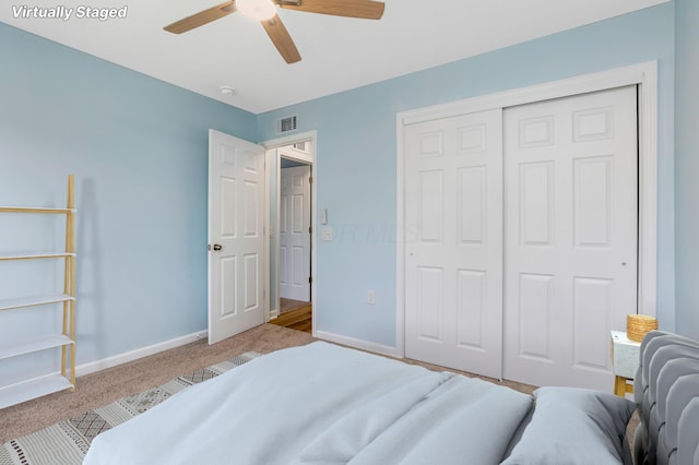 225 Reeb Ave, Columbus, OH 43207 - bedroom with carpet floors, a closet, and ceiling fan