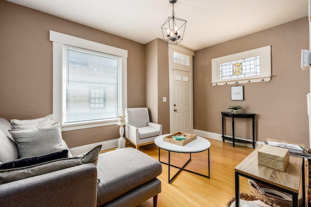 sitting room with light wood-style floors and baseboards