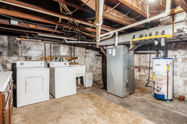 unfinished basement with water heater, washing machine and dryer, heating unit, and a sink