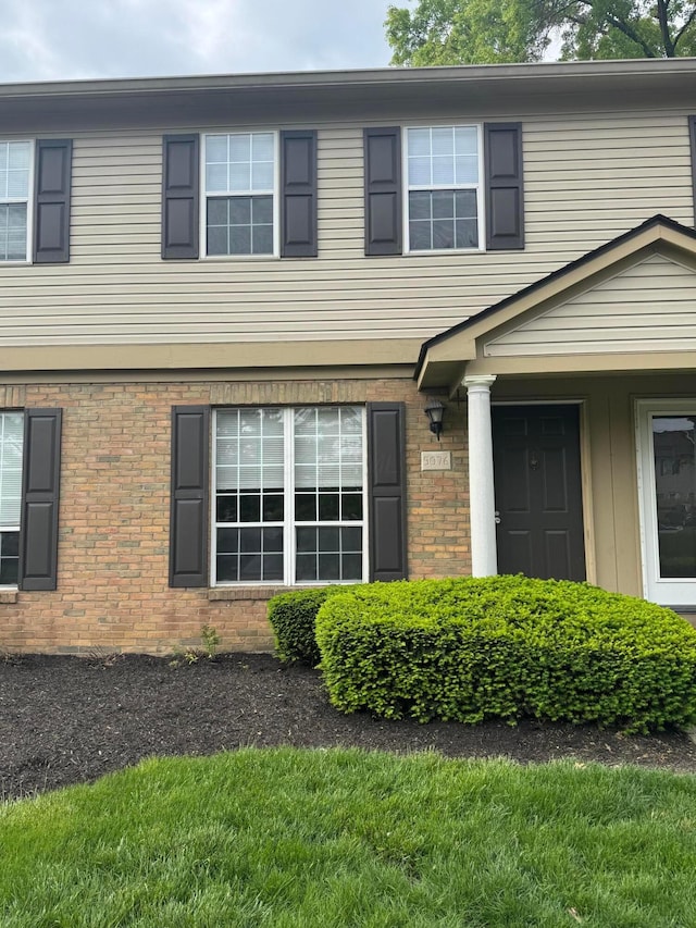 5076 Dalmeny Ct, Columbus, OH 43220 - view of front facade featuring brick siding