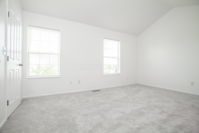 960 Hartford Village Blvd, Columbus, OH 43228 - carpeted empty room featuring vaulted ceiling and baseboards