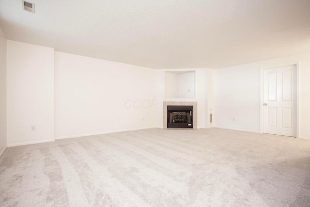 960 Hartford Village Blvd, Columbus, OH 43228 - unfurnished living room with carpet floors, a fireplace, and baseboards
