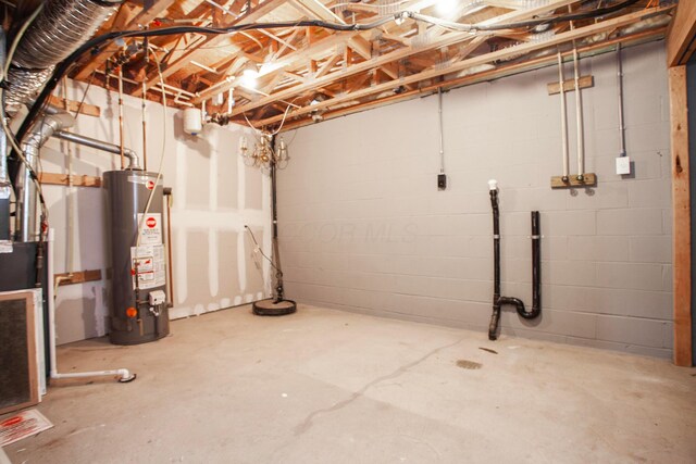 960 Hartford Village Blvd, Columbus, OH 43228 - unfinished below grade area featuring gas water heater and concrete block wall