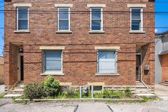 204-206 E Blenkner St, Columbus, OH 43206 - view of property exterior featuring brick siding and entry steps