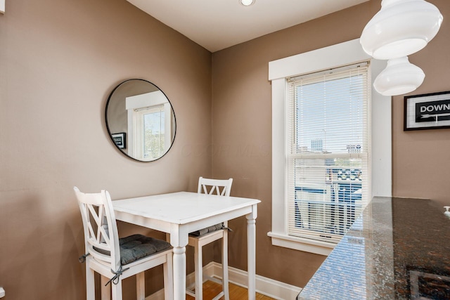 204-206 E Blenkner St, Columbus, OH 43206 - dining room with healthy amount of natural light and baseboards