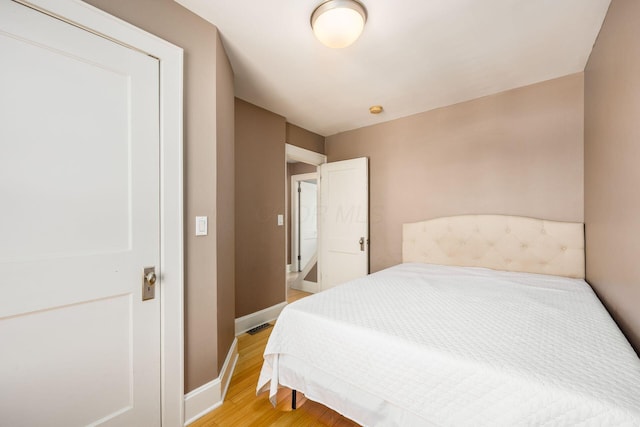 204-206 E Blenkner St, Columbus, OH 43206 - bedroom featuring light wood-style floors and baseboards