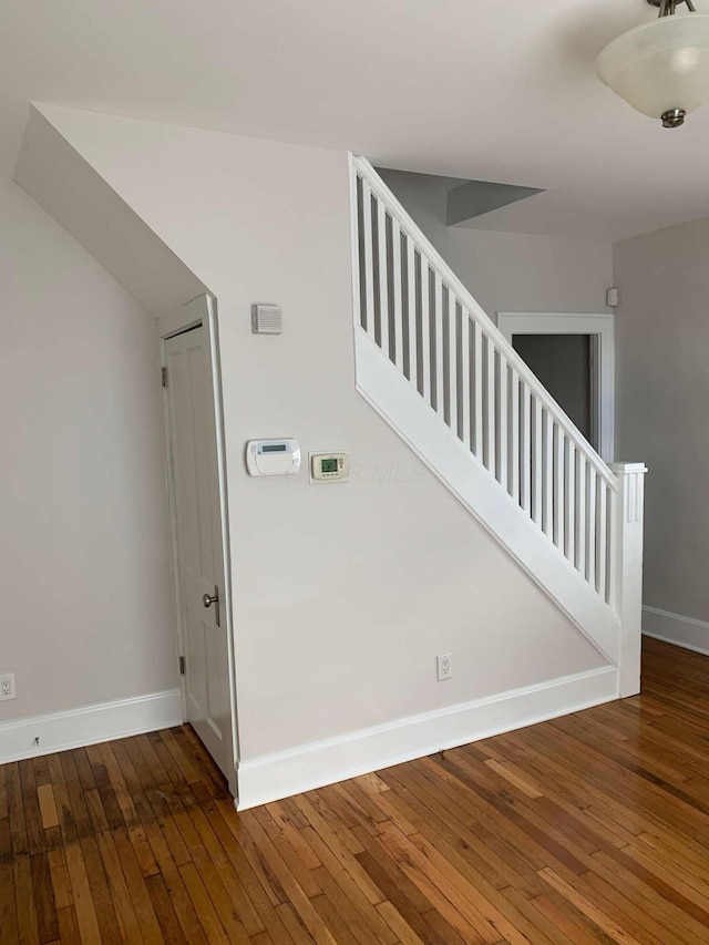 204-206 E Blenkner St, Columbus, OH 43206 - stairway featuring hardwood / wood-style flooring and baseboards