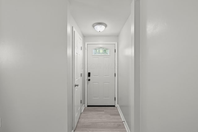 4187 Medway Ave, Columbus, OH 43213 - doorway with light wood-type flooring and baseboards