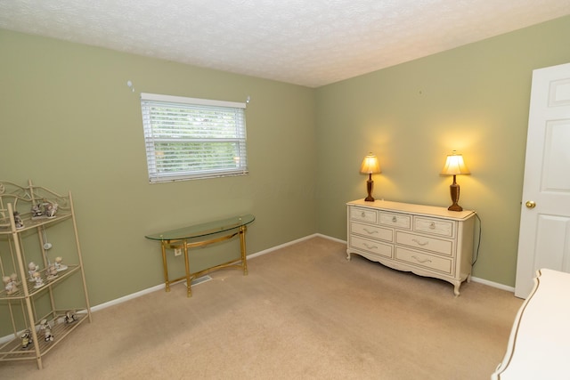 245 Hubbard Rd, Galloway, OH 43119 - bedroom featuring light colored carpet, a textured ceiling, and baseboards