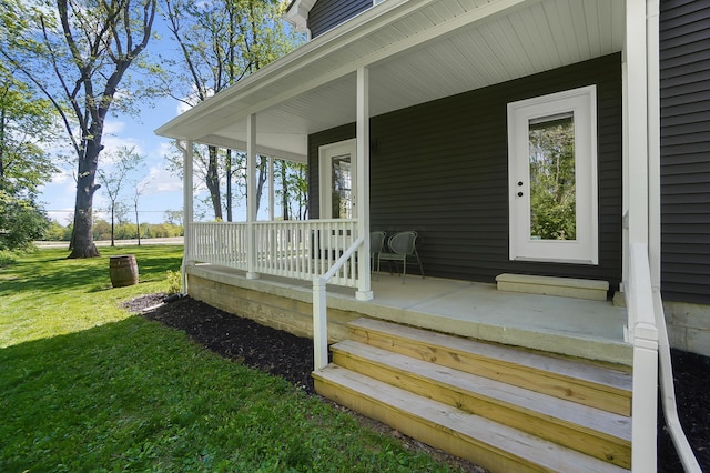 7353 Selma Pike, South Charleston, OH 45368 - entrance to property featuring a porch and a lawn