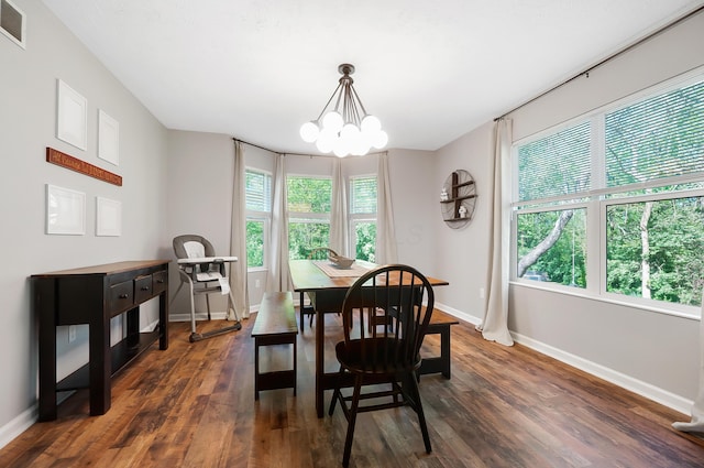 7353 Selma Pike, South Charleston, OH 45368 - dining area featuring baseboards, healthy amount of natural light, and dark wood-style floors
