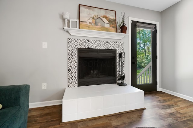 7353 Selma Pike, South Charleston, OH 45368 - detailed view of wood finished floors, baseboards, and a tiled fireplace