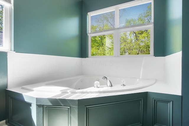 7353 Selma Pike, South Charleston, OH 45368 - bathroom with plenty of natural light and a tub with jets