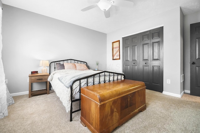 7353 Selma Pike, South Charleston, OH 45368 - bedroom with light colored carpet, baseboards, a closet, and a ceiling fan