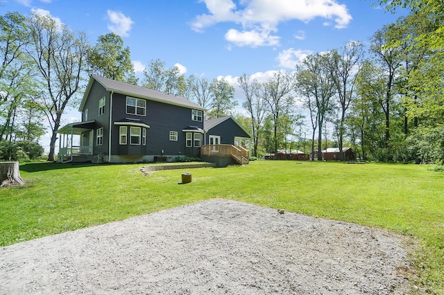 7353 Selma Pike, South Charleston, OH 45368 - rear view of property featuring a lawn