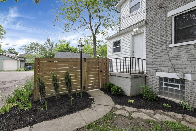 255 E Kelso Rd, Columbus, OH 43202 - view of patio / terrace featuring fence and a detached garage