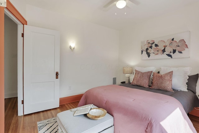 255 E Kelso Rd, Columbus, OH 43202 - bedroom featuring wood finished floors, baseboards, and a ceiling fan