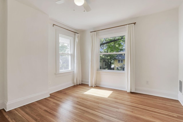 255 E Kelso Rd, Columbus, OH 43202 - spare room with light wood-type flooring, ceiling fan, and baseboards