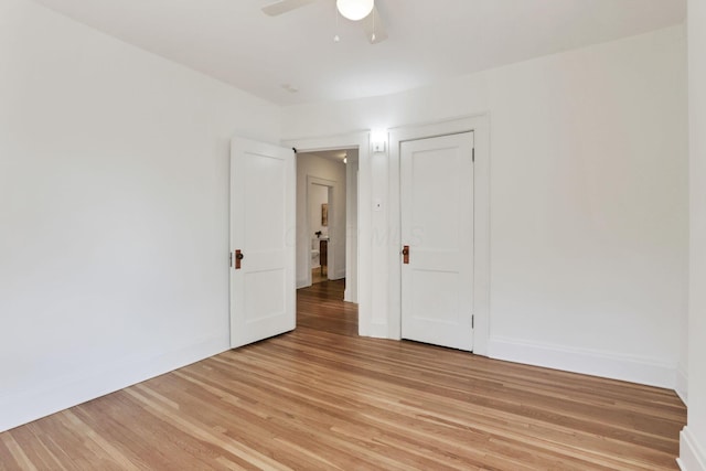 255 E Kelso Rd, Columbus, OH 43202 - unfurnished room with light wood-type flooring, a ceiling fan, and baseboards