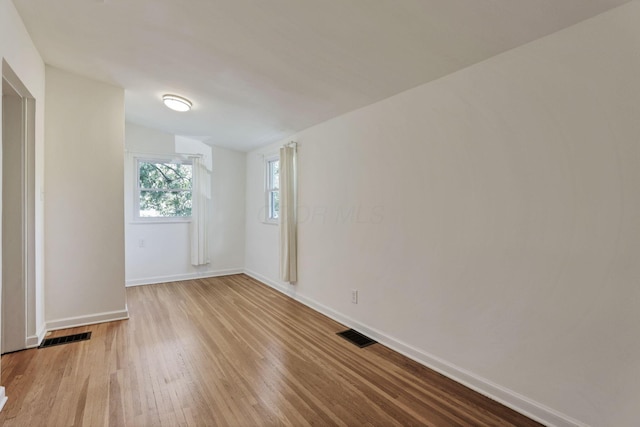 255 E Kelso Rd, Columbus, OH 43202 - empty room with wood finished floors and baseboards