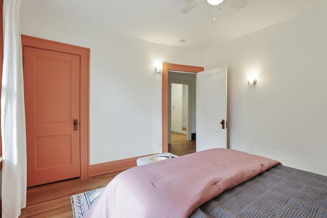 255 E Kelso Rd, Columbus, OH 43202 - bedroom with light wood finished floors, baseboards, and ceiling fan