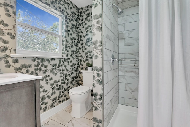 255 E Kelso Rd, Columbus, OH 43202 - full bath featuring wallpapered walls, a shower stall, toilet, baseboards, and vanity