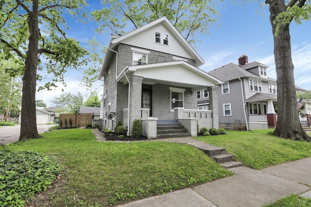 255 E Kelso Rd, Columbus, OH 43202 - american foursquare style home featuring brick siding and a porch