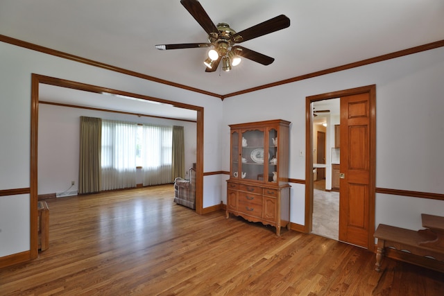 6070 Barberry Holw, Columbus, OH 43213 - empty room with light wood-style flooring, ceiling fan, ornamental molding, and baseboards