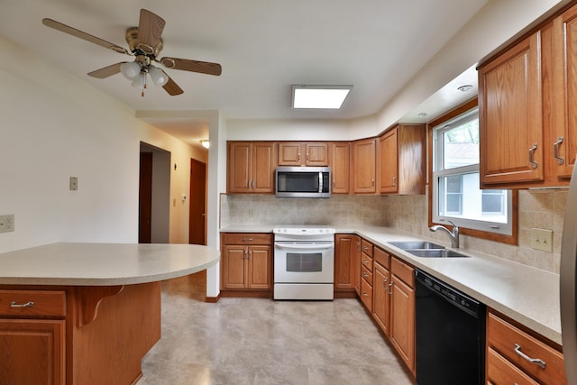 6070 Barberry Holw, Columbus, OH 43213 - kitchen with dishwasher, stainless steel microwave, a sink, white electric range oven, and brown cabinetry