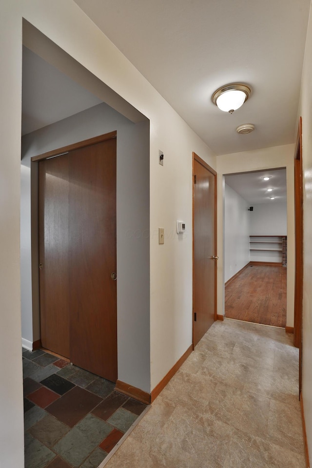 6070 Barberry Holw, Columbus, OH 43213 - corridor featuring baseboards and stone finish flooring