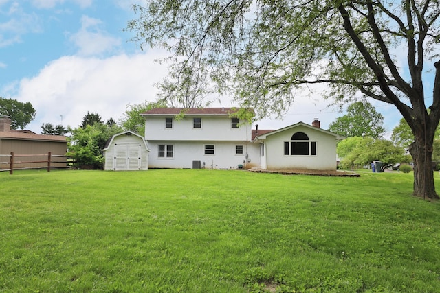 6070 Barberry Holw, Columbus, OH 43213 - back of property featuring a shed, stucco siding, and an outbuilding