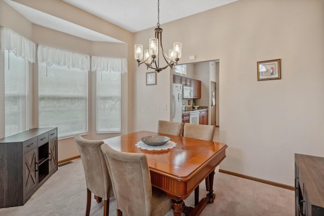 890 Brockwell Dr, Westerville, OH 43081 - dining room featuring a chandelier, light carpet, and baseboards
