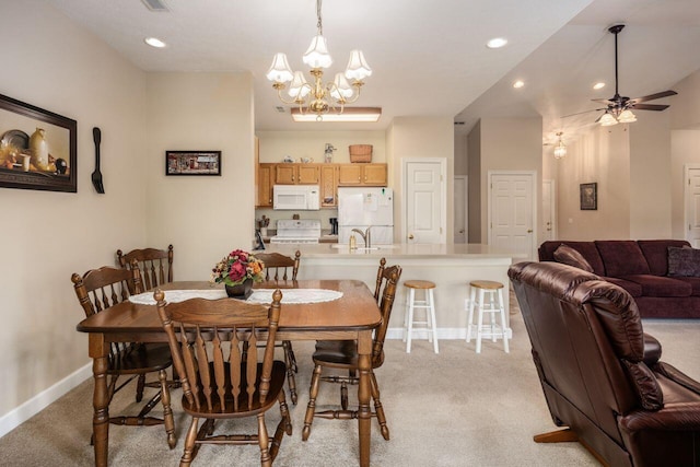 4 Claire Ct, Circleville, OH 43113 - dining space featuring a chandelier, light colored carpet, baseboards, ceiling fan, and recessed lighting
