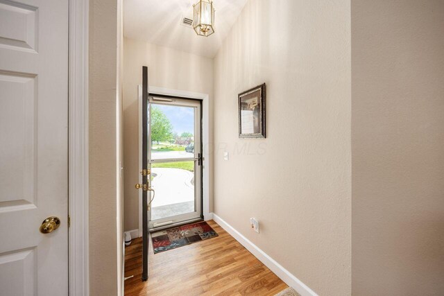 4 Claire Ct, Circleville, OH 43113 - doorway to outside featuring light wood finished floors and baseboards