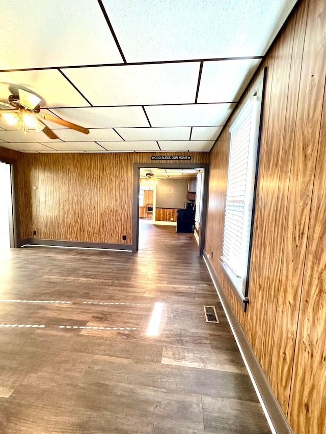 619 Sugar St, Marion, OH 43302 - hall with wooden walls and wood finished floors
