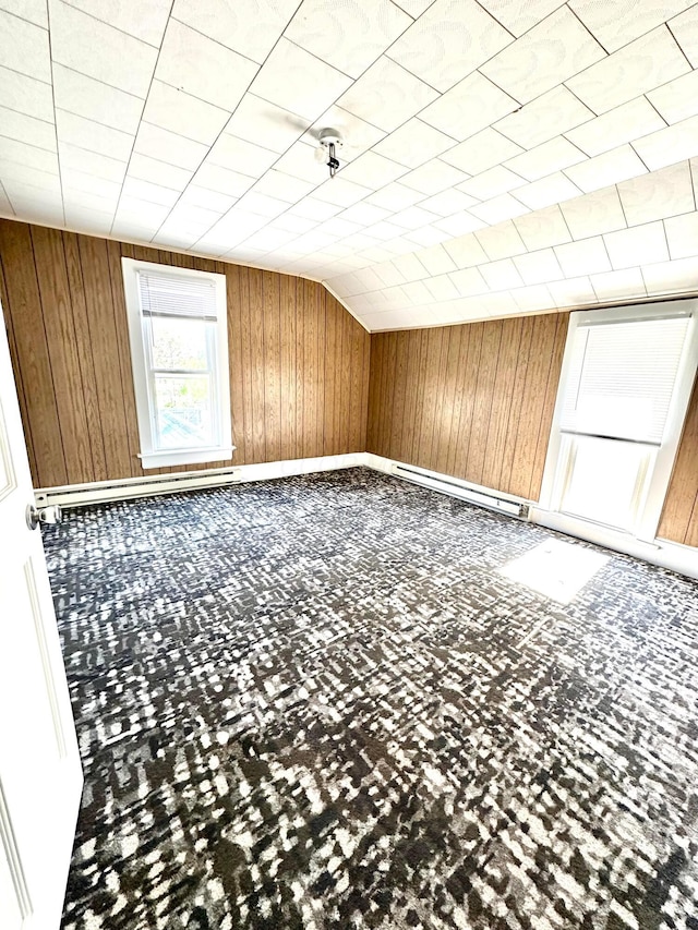 619 Sugar St, Marion, OH 43302 - bonus room featuring wood walls and baseboard heating