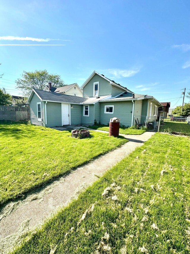 619 Sugar St, Marion, OH 43302 - back of property featuring a fire pit