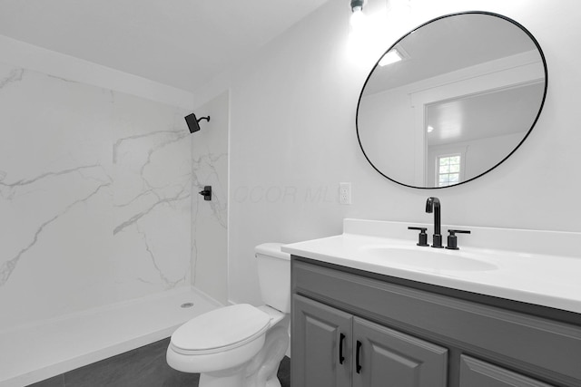 524 Avondale Ave, Marion, OH 43302 - bathroom featuring vanity, a marble finish shower, and toilet