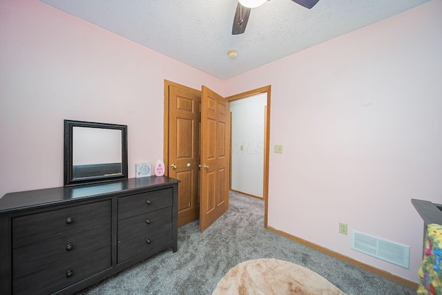 5039 Lee Rd, South Bloomfield, OH 43103 - bedroom featuring light colored carpet, baseboards, a textured ceiling, and ceiling fan