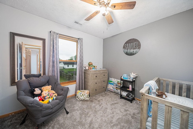 5039 Lee Rd, South Bloomfield, OH 43103 - bedroom with carpet, baseboards, a textured ceiling, and a ceiling fan