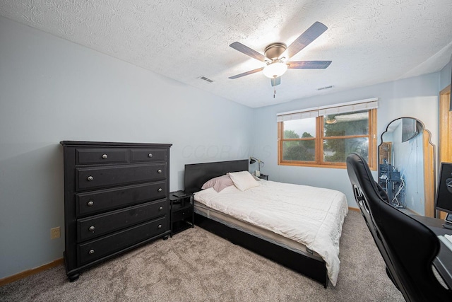 5039 Lee Rd, South Bloomfield, OH 43103 - carpeted bedroom featuring a textured ceiling, a ceiling fan, and baseboards