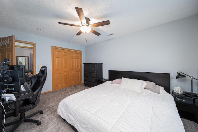 5039 Lee Rd, South Bloomfield, OH 43103 - carpeted bedroom featuring a desk, a ceiling fan, and a textured ceiling